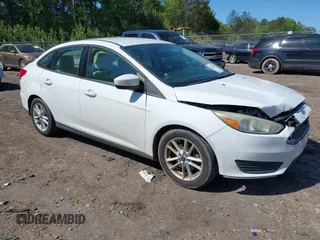 2015 Ford Focus SE with VIN 1FADP3F22FL227789, listed as a IAAI auction lot 42009953 with 191,570 mi miles. Bid and sale history available at carsss.com. Image 1.