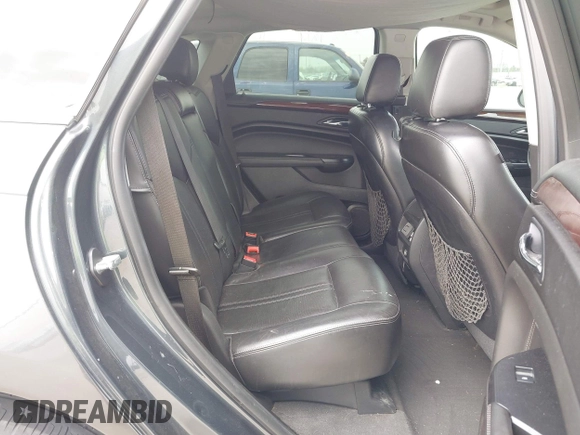 2013 Cadillac SRX Performance Collection with VIN 3GYFNDE38DS568561, listed as a IAAI auction lot 41701063 with 139,191 mi miles. Bid and sale history available at carsss.com. Image 8.