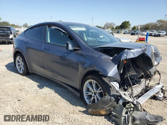 2023 Tesla Model Y Long Range with VIN 7SAYGDEE2PA164405, listed as a Copart auction lot 50085905 with 42,156 mi miles and Salvage Title. Bid and sale history available at DreamBid. Image 4.