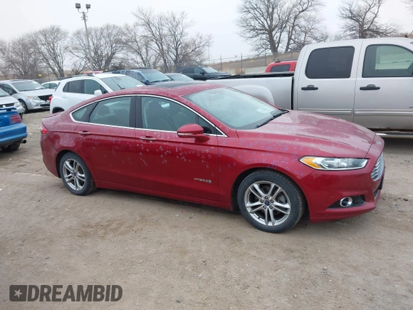 2016 Ford Fusion Titanium Hybrid with VIN 3FA6P0RU3GR355398, listed as a IAAI auction lot 41140669 with 125,959 mi miles. Bid and sale history available at carsss.com. Image 13.