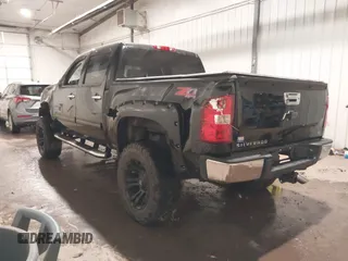2013 Chevrolet Silverado 1500 LT with VIN 3GCPKSE75DG238194, listed as a IAAI auction lot 40997920 with 163,303 mi miles. Bid and sale history available at carsss.com. Image 3.