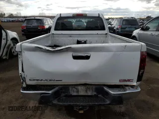 2012 GMC Canyon z VIN 1GTE5NFE9C8150251, wystawiony jako Copart lot #52897835 z przebiegiem 195 834 mil mil oraz Czysty tytuł • Clean title. Historia ofert i sprzedaży dostępna na DreamBid. Obrazek 6.