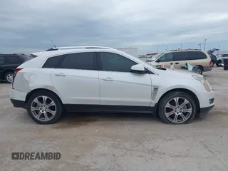 2012 Cadillac SRX Premium Collection with VIN 3GYFNCE32CS579256, listed as a IAAI auction lot 42660666 with 125,236 mi miles and . Bid and sale history available at DreamBid. Image 13.