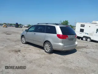 2005 Toyota Sienna XLE with VIN 5TDZA22C85S254910, listed as a IAAI auction lot 42586871 with 241,522 mi miles and . Bid and sale history available at DreamBid. Image 3.