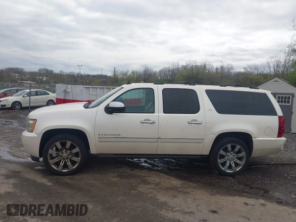 2010 Chevrolet Suburban LTZ with VIN 1GNUKKE35AR129351, listed as a IAAI auction lot 41971625 with 234,487 mi miles. Bid and sale history available at carsss.com. Image 14.