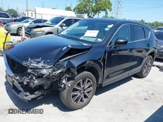2017 Mazda CX-5 Grand Touring with VIN JM3KFBDL6H0200830, listed as a IAAI auction lot 42005145 with 90,510 mi miles. Bid and sale history available at carsss.com. Image 17.