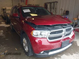 2013 Dodge Durango SXT with VIN 1C4RDJAG4DC527945, listed as a IAAI auction lot 41590545 with 141,074 mi miles and . Bid and sale history available at DreamBid. Image 1.