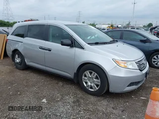 2011 Honda Odyssey LX z VIN 5FNRL5H25BB040287, wystawiony jako IAAI lot #42456679 z przebiegiem 129 176 mil mil oraz . Historia ofert i sprzedaży dostępna na DreamBid. Obrazek 1.