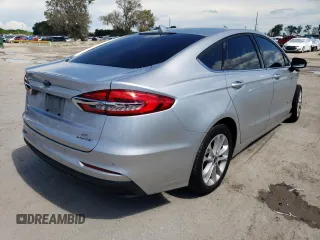 2019 Ford Fusion Hybrid SE with VIN 3FA6P0LU8KR242998, listed as a Copart auction lot 48927543 with 102,036 mi miles. Bid and sale history available at carsss.com. Image 4.