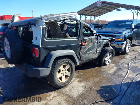 2017 Jeep Wrangler Sport with VIN 1C4GJWAG9HL567022, listed as a IAAI auction lot 40900310 with 81,196 mi miles and . Bid and sale history available at DreamBid. Image 4.