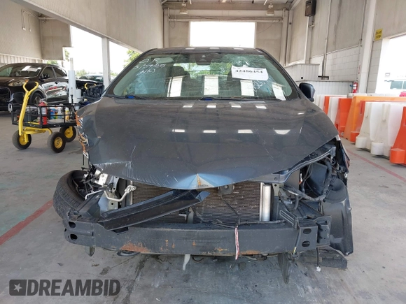 2018 Toyota Corolla L z VIN 5YFBURHE0JP802699, wystawiony jako IAAI lot #42486454 z przebiegiem 134 040 mil mil oraz . Historia ofert i sprzedaży dostępna na DreamBid. Obrazek 13.