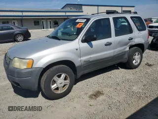 2002 Ford Escape XLS Choice with VIN 1FMYU02112KB00947, listed as a Copart auction lot 48948855 with 223,287 mi miles and Salvage title. Bid and sale history available at DreamBid. Image 1.