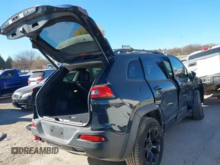 2017 Jeep Cherokee Trailhawk L Plus with VIN 1C4PJMBBXHW634944, listed as a IAAI auction lot 41022673 with 116,542 mi miles. Bid and sale history available at carsss.com. Image 4.