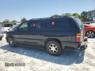 2006 GMC Yukon XL with VIN 1GKFK66U46J165428, listed as a Copart auction lot 52756205 with Not provided miles and Salvage title. Bid and sale history available at DreamBid. Image 2.