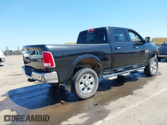 2015 Ram 2500 Laramie with VIN 3C6UR5FL4FG651469, listed as a IAAI auction lot 42179544 with 190,222 mi miles and . Bid and sale history available at DreamBid. Image 4.