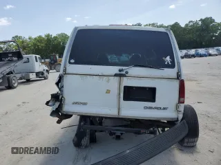 2000 Chevrolet Astro z VIN 1GNDM19W1YB130461, wystawiony jako Copart lot #54659485 z przebiegiem 178 132 mil mil oraz Szkody całkowita. Historia ofert i sprzedaży dostępna na DreamBid. Obrazek 6.