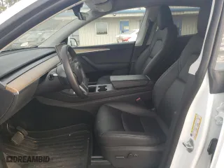2022 Tesla Model Y Long Range with VIN 7SAYGDEE9NA018421, listed as a Copart auction lot 46869185 with 34,632 mi miles and Salvage Title. Bid and sale history available at carsss.com. Image 7.