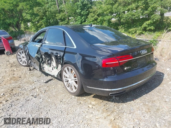 2015 Audi A8 4.0T with VIN WAU32AFD3FN039603, listed as a IAAI auction lot 42267467 with 120,393 mi miles and . Bid and sale history available at DreamBid. Image 3.