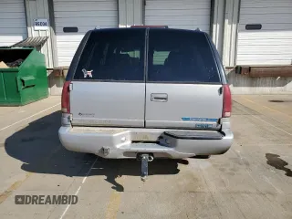 1999 GMC Denali z VIN 1GKEK13R0XR916686, wystawiony jako Copart lot #61120914 z przebiegiem 240 605 mil mil oraz Szkody całkowita. Historia ofert i sprzedaży dostępna na DreamBid. Obrazek 6.