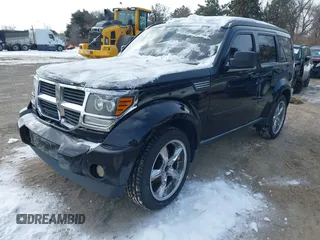 2007 Dodge Nitro SLT with VIN 1D8GU58K97W583862, listed as a IAAI auction lot 41378801 with 227,713 mi miles. Bid and sale history available at carsss.com. Image 2.