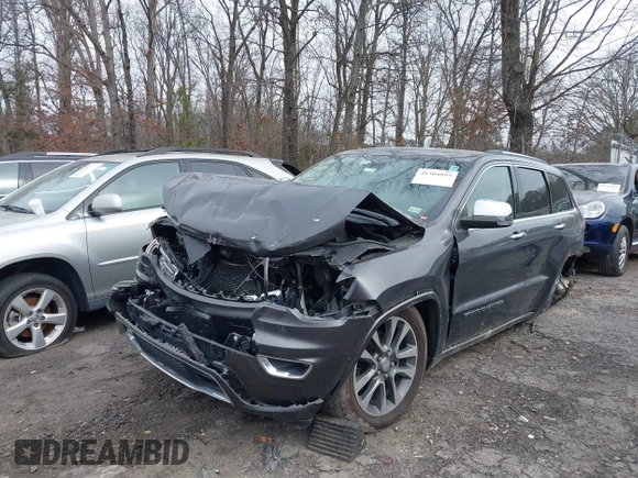 2017 Jeep Grand Cherokee Overland with VIN 1C4RJFCG8HC772837, listed as a IAAI auction lot 41304895 with 71,338 mi miles. Bid and sale history available at carsss.com. Image 2.