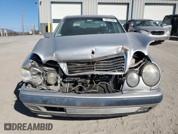1999 Mercedes-Benz E-Class with VIN WDBJF82H3XX025477, listed as a Copart auction lot 78813364 with 235,541 mi miles and Salvage Title. Bid and sale history available at carsss.com. Image 5.
