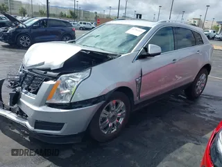 2016 Cadillac SRX Luxury Collection z VIN 3GYFNBE38GS520891, wystawiony jako IAAI lot #41781445 z przebiegiem 52 202 mil mil oraz . Historia ofert i sprzedaży dostępna na DreamBid. Obrazek 18.