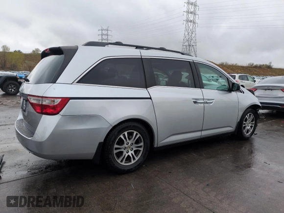 2012 Honda Odyssey EX-L with VIN 5FNRL5H68CB141022, listed as a Copart auction lot 54605485 with 185,388 mi miles and Salvage Title. Bid and sale history available at carsss.com. Image 3.