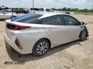 2021 Toyota Prius LE z VIN JTDKAMFP8M3177157, wystawiony jako Copart lot #63668045 z przebiegiem 44 760 mil mil oraz Czysty tytuł • Clean title. Historia ofert i sprzedaży dostępna na DreamBid. Obrazek 3.