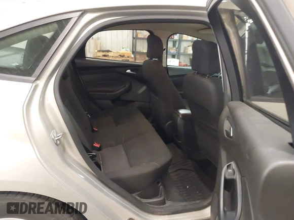 2015 Ford Focus SE with VIN 1FADP3F24FL343320, listed as a IAAI auction lot 41994901 with 201,300 mi miles and . Bid and sale history available at DreamBid. Image 8.