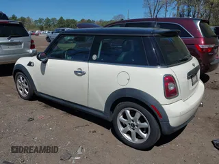 2007 MINI Hardtop with VIN WMWMF33527TT54584, listed as a IAAI auction lot 42166126 with 85,978 mi miles and . Bid and sale history available at DreamBid. Image 3.