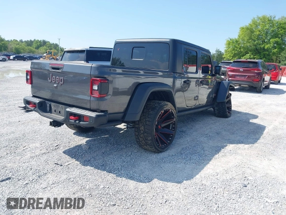 2020 Jeep Gladiator Rubicon with VIN 1C6JJTBG0LL187537, listed as a IAAI auction lot 42018914 with 53,443 mi miles and . Bid and sale history available at DreamBid. Image 4.