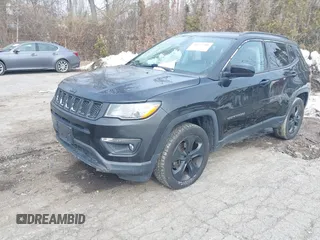 2018 Jeep Compass Altitude with VIN 3C4NJDBB1JT132052, listed as a IAAI auction lot 41622700 with 99,534 mi miles and . Bid and sale history available at carsss.com. Image 2.
