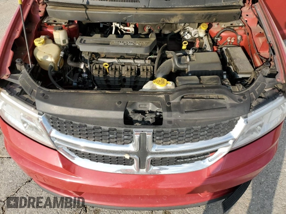 2015 Dodge Journey American Value with VIN 3C4PDCABXFT720583, listed as a Copart auction lot 52882515 with 173,575 mi miles and Salvage Title. Bid and sale history available at DreamBid. Image 12.