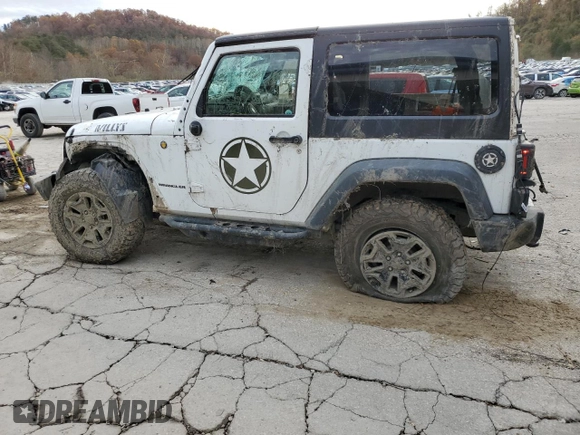 2017 Jeep Wrangler Willys Wheeler with VIN 1C4AJWAG7HL589574, listed as a Copart auction lot 79006504 with 117,075 mi miles and Salvage Title. Bid and sale history available at DreamBid. Image 2.