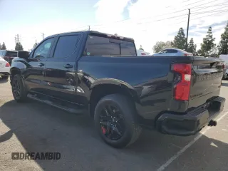 2022 Chevrolet Silverado 1500 RST with VIN 1GCPWDED5NZ142606, listed as a Copart auction lot 79077014 with 26,769 mi miles and Salvage Title. Bid and sale history available at carsss.com. Image 2.