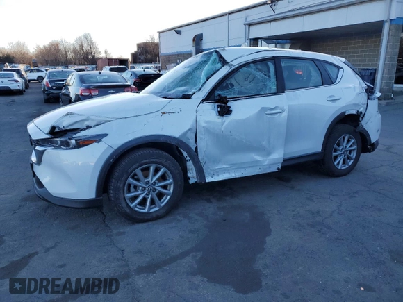 2023 Mazda CX-5 2.5 S with VIN JM3KFBAM6P0269481, listed as a Copart auction lot 87222194 with 21,070 mi miles and Salvage Title. Bid and sale history available at carsss.com. Image 1.