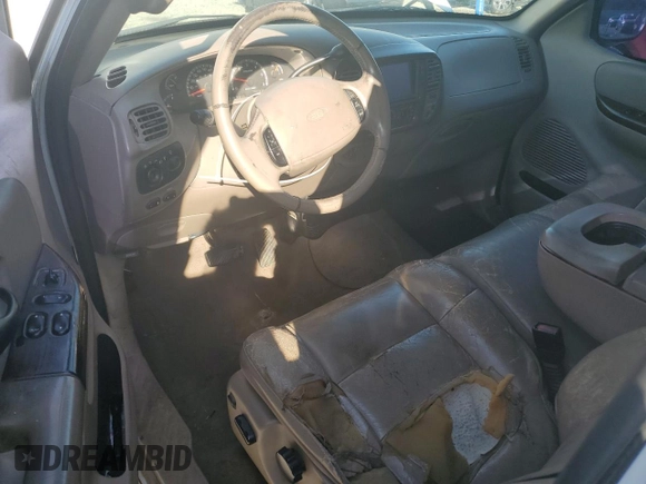 2001 Ford F-150 XL z VIN 2FTRX08LX1CB01820, wystawiony jako Copart lot #48785635 z przebiegiem 334 615 mil mil oraz Szkoda całkowita • Salvage title. Historia ofert i sprzedaży dostępna na DreamBid. Obrazek 8.