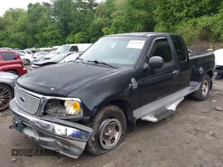 2003 Ford F-150 XL with VIN 1FTRX07W73KD29879, listed as a IAAI auction lot 42356048 with Not provided miles and . Bid and sale history available at DreamBid. Image 2.