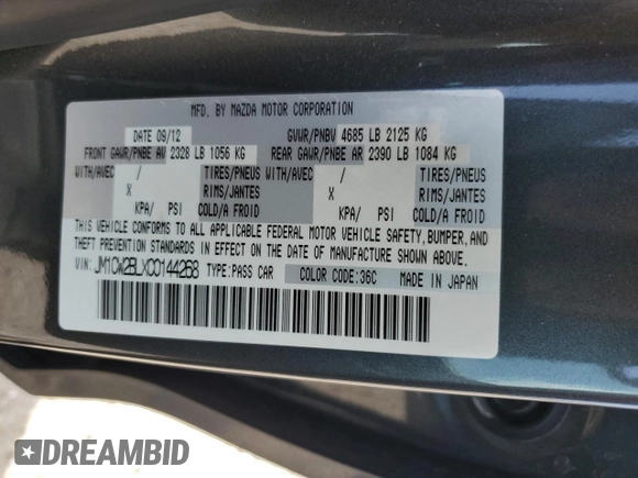 2012 Mazda 5 Sport with VIN JM1CW2BLXC0144268, listed as a Copart auction lot 53838745 with 47,993 mi miles and Salvage Title. Bid and sale history available at DreamBid. Image 13.