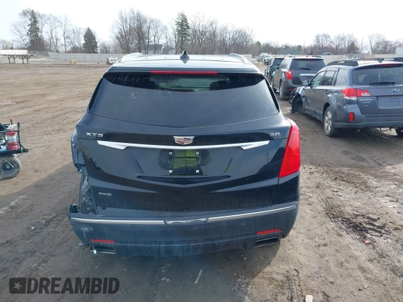 2019 Cadillac XT5 Luxury AWD with VIN 1GYKNDRS5KZ172975, listed as a IAAI auction lot 41814397 with 63,563 mi miles and . Bid and sale history available at carsss.com. Image 16.