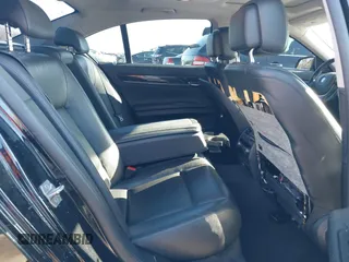 2013 BMW 7 Series 740i with VIN WBAYA6C55DC995094, listed as a IAAI auction lot 41246796 with 164,394 mi miles. Bid and sale history available at carsss.com. Image 8.