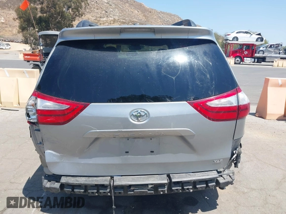 2015 Toyota Sienna XLE with VIN 5TDYK3DC0FS589947, listed as a IAAI auction lot 36567379 with 130,969 mi miles and . Bid and sale history available at DreamBid. Image 16.
