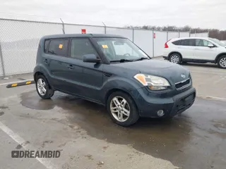 2011 Kia Soul + with VIN KNDJT2A24B7258457, listed as a IAAI auction lot 41751948 with 217,667 mi miles. Bid and sale history available at carsss.com. Image 1.