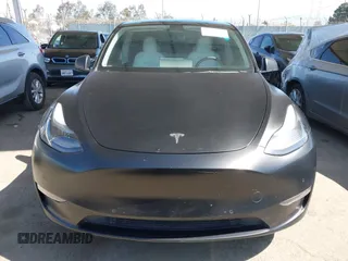 2022 Tesla Model Y Performance z VIN 7SAYGDEF0NF491586, wystawiony jako IAAI lot #42276747 z przebiegiem 117 203 mil mil oraz . Historia ofert i sprzedaży dostępna na DreamBid. Obrazek 12.