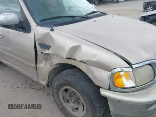 1997 Ford Expedition XLT with VIN 1FMEU1765VLB24163, listed as a IAAI auction lot 42303093 with 137,427 mi miles and . Bid and sale history available at DreamBid. Image 6.