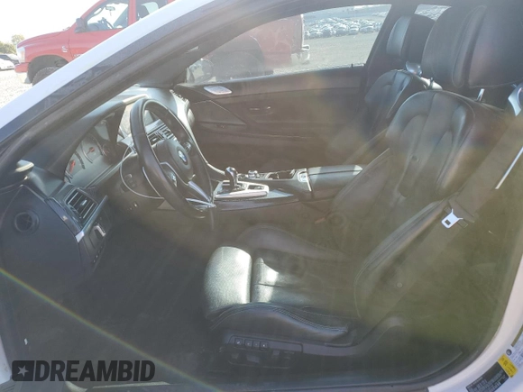 2014 BMW M6 z VIN WBSLX9C51ED160143, wystawiony jako Copart lot #50762185 z przebiegiem 91 718 mil mil oraz Szkody całkowita. Historia ofert i sprzedaży dostępna na DreamBid. Obrazek 7.