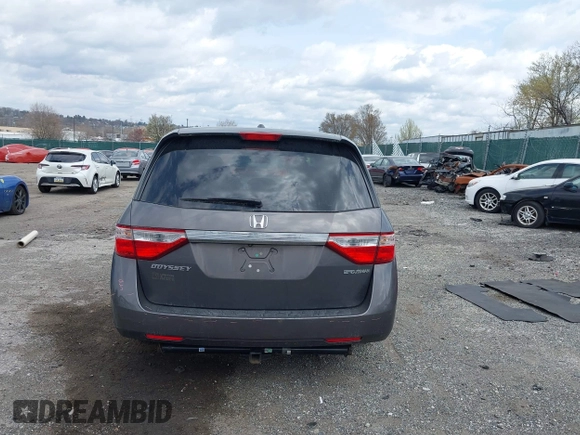 2013 Honda Odyssey EX-L with VIN 5FNRL5H63DB034963, listed as a IAAI auction lot 41921431 with 163,609 mi miles and . Bid and sale history available at DreamBid. Image 16.
