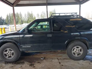 1999 Chevrolet Blazer LS with VIN 1GNCT18W3XK216840, listed as a IAAI auction lot 41534524 with 199,982 mi miles and . Bid and sale history available at DreamBid. Image 14.