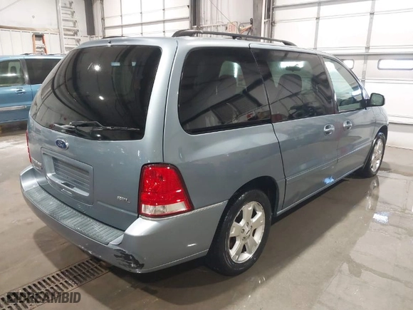 2005 Ford Freestar Wagon SEL with VIN 2FMZA52265BA19556, listed as a IAAI auction lot 41409009 with 259,346 mi miles. Bid and sale history available at carsss.com. Image 4.